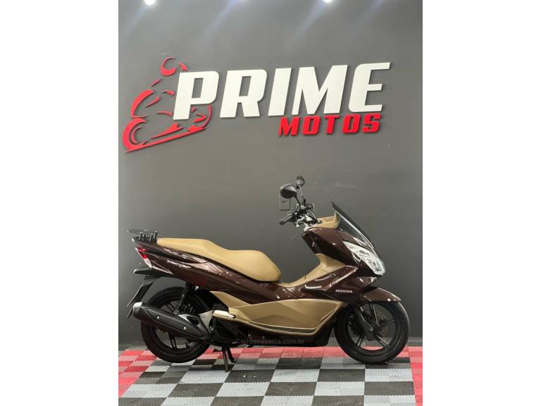 HONDA - PCX - 2017/2017 - Marrom - R$ 14.900,00